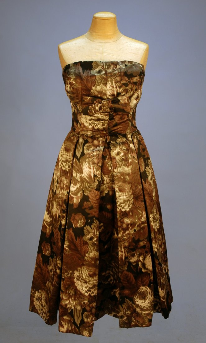 DIOR COUTURE WARP PRINTED SILK COCKTAIL DRESS and : DIOR COUTURE WARP PRINTED SILK COCKTAIL DRESS and STOLE, 1950's. Strapless ballerina length with boned corset, pleated full skirt, bow detail on bodice, back zipper in a brown, grey, black and white r