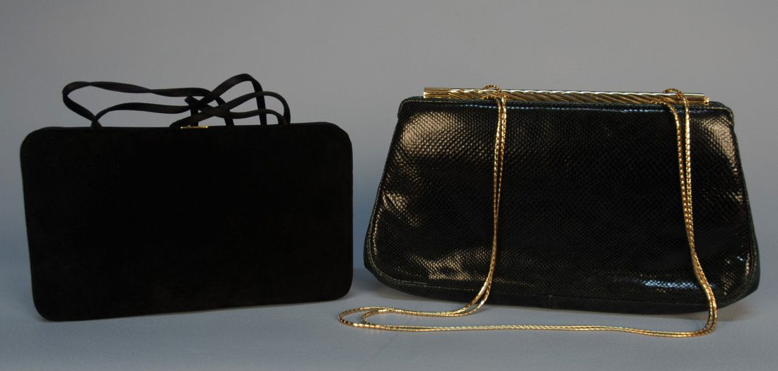TWO JUDITH LEIBER HANDBAGS, 20th C. One black liza: TWO JUDITH LEIBER HANDBAGS, 20th C. One black lizard with diagonal fluted brass frame and twin chain handles, lined in silk faille with one open and one zippered pocket, two outside pockets, Leiber mi
