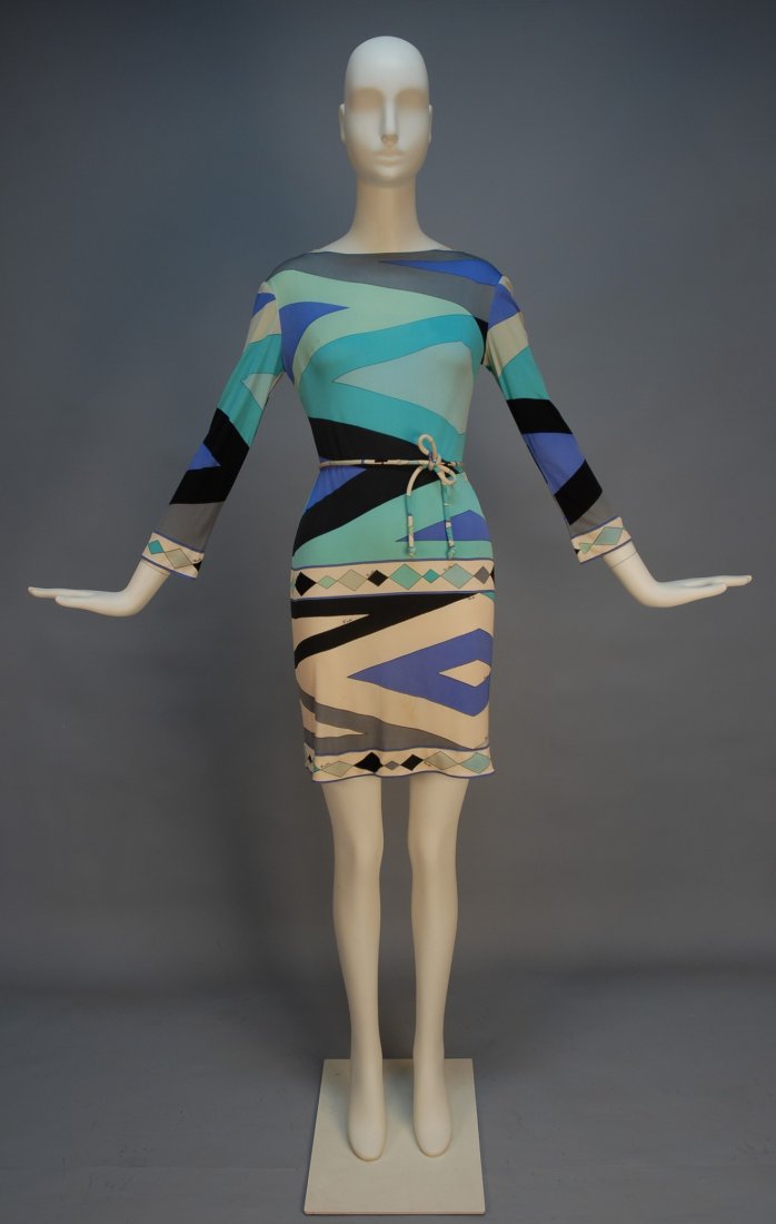 PUCCI PRINTED SILK JERSEY MINI DRESS, c. 1970. Lon: PUCCI PRINTED SILK JERSEY MINI DRESS, c. 1970. Long sleeve with boat neck and self belt having signature "Emilio" abstract print in shades of aqua, blue, grey, black and white. Label "Emilio Pucci Flo