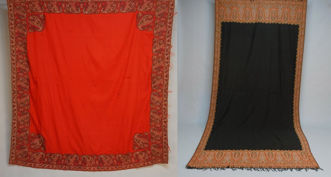 TWO PAISLEY SHAWLS, 19th C.: One long paisley with open black field. 60 x 126. (Few small holes) very good. One square with open red center. 62 x 65. (Several holes in center) fair.