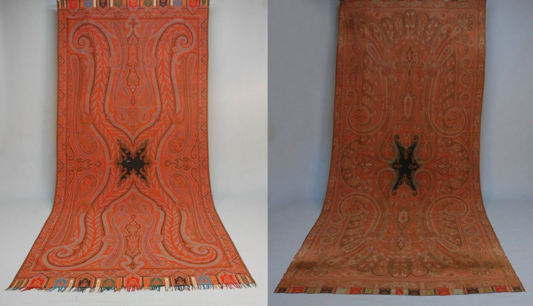 TWO PAISLEY SHAWLS, 19th C.: Both Scottish long shawls: One with small black star center having strong white signature, deep palmettes and paisleys, with sophisticated tabbed border, very tight weave. 134 x 62. (Small hole in one