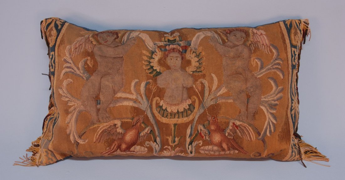 AUBUSSON TAPESTRY FRAGMENT, 19th C., MOUNTED as PI: Long rectangle with cherubs and birds in scrolling foliage with end borders, having modern fringe and backing. 14 1/2 x 25. (Very minor losses) excellent.