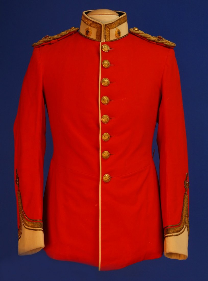 NORTHHAMPSHIRE 48th/58th REGIMENTAL DRESS TUNIC, c: Complete dress tunic in red and white with gold galloon and braided epaulettes. Ch-34, L-30. (Some surface moth damage) very good.