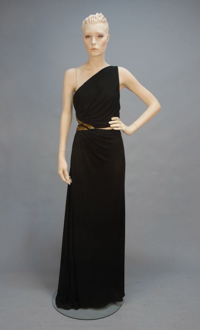 ALBER ELBAZ for GEOFFREY BEENE ONE-SHOULDER EVENI: Black draped silk jersey having cut-out at left waist, bodice back decorated allover in abstract gold and black sequinned leaf design, skirt falling to floor with pleats at right waist, side bodice ho