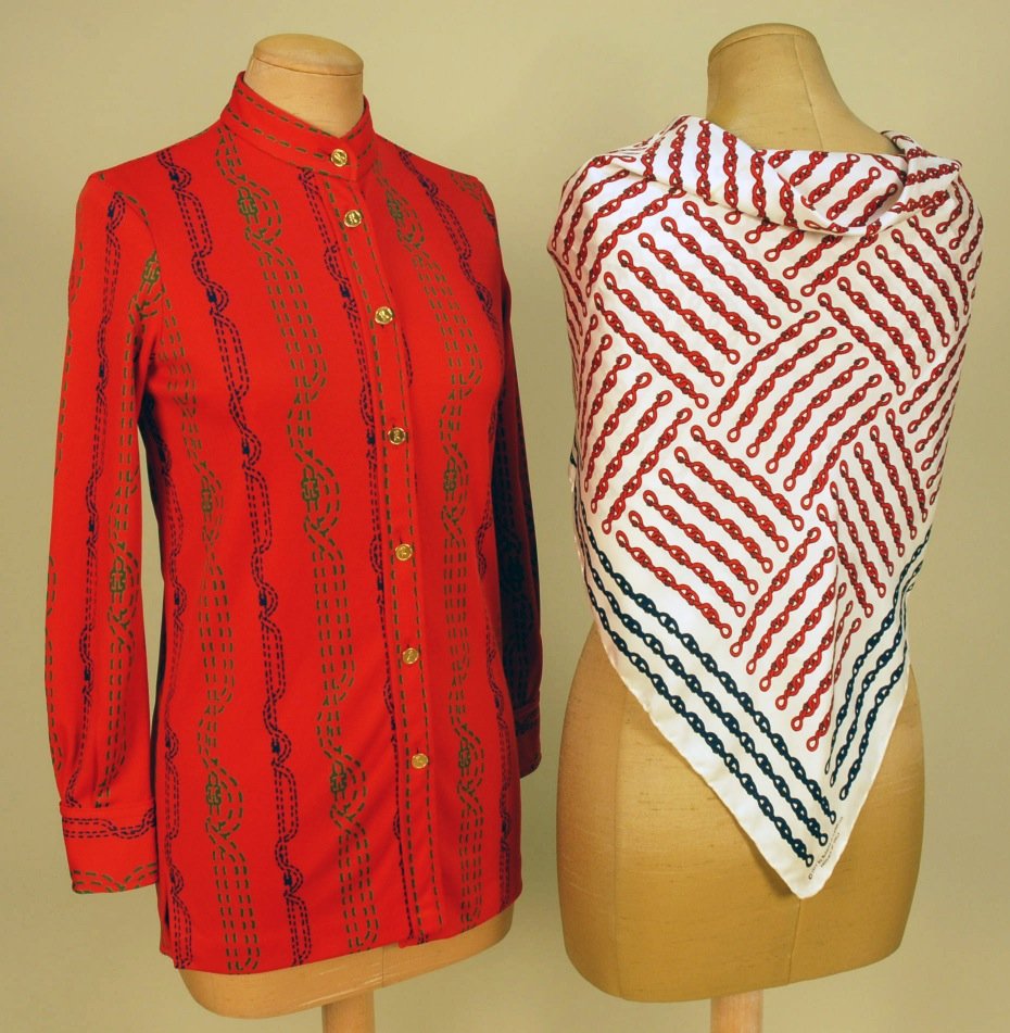 ROBERTA di CAMERINO BLOUSE and SCARF, 1970's.: Red polyester knit long sleeve blouse with red and green vertical stripe print with buckles, stand collar, brass buttons, (one cuff button replaced). B-34. Printed silk scarf in cream twill printed wi