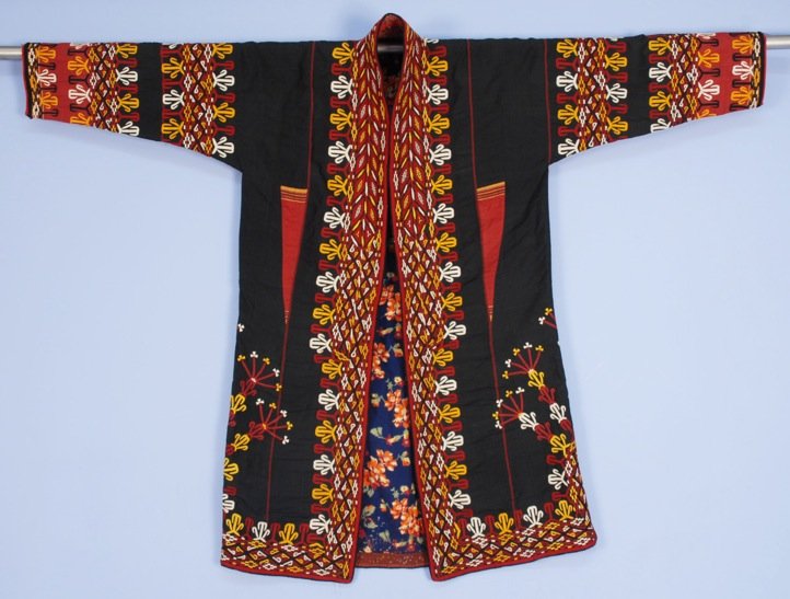 TURKMAN CHYRPY, EARLY 20th C.: Black silk with typical red, white and yellow embroidery, colorful cotton and cotton flannel lining. Excellent.