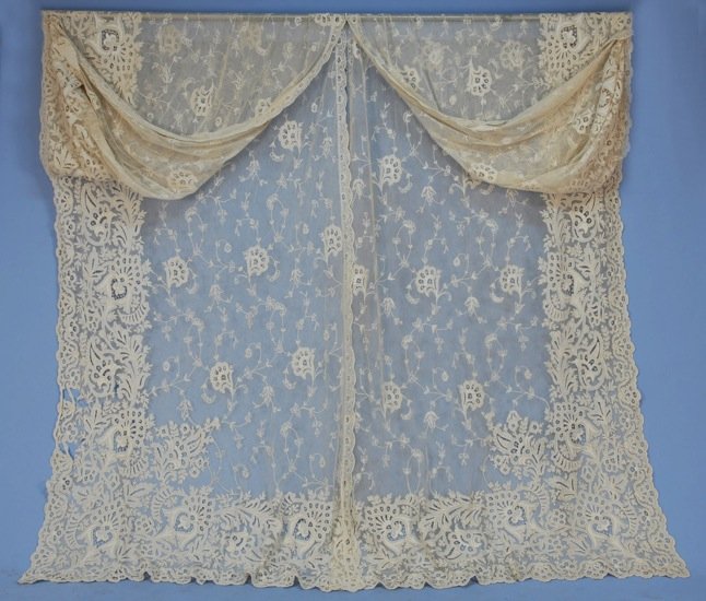 LACE CURTAIN PANELS and BED COVERS, 1920's-1930's.: Pair of oversized white applique lace on net curtains with tambour embroidery and elaborate border design, each 64 x 150, (one panel several tears, one panel small hole in border) fair-excellent. Pair