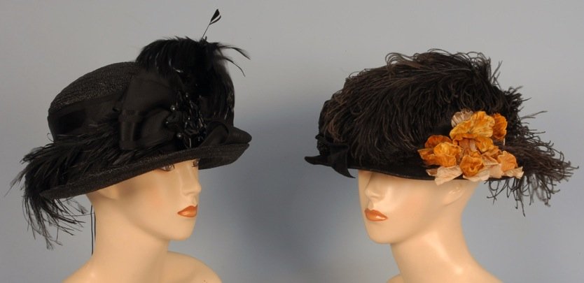 TWO LADIES' HATS, c. 1910.: One black straw with up-turned brim having wide ribbon band and bow, ornament of faceted paillettes and feathers. 11 inches wide. One black velvet decorated with cloth flowers, ostrich plumes, velvet