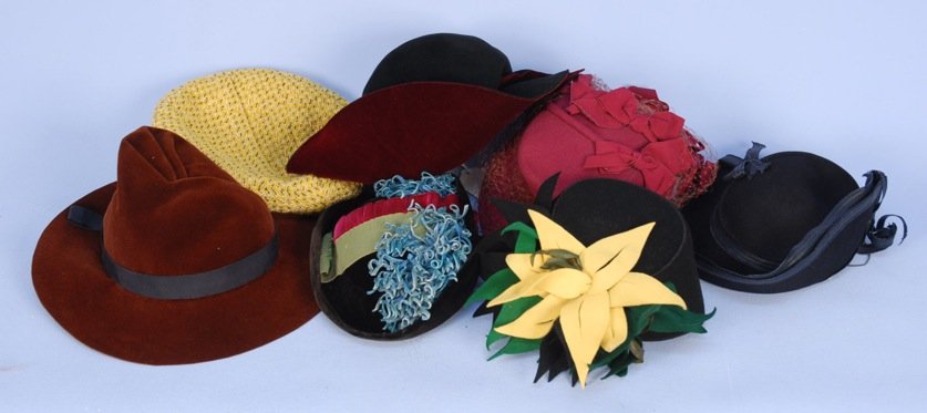 SEVEN HATS, 1930's.: Mostly felt, including Rose Descat and Madame Luzy, Paris, various trims, felt flowers, ribbons, straw and chenille etc. Very good-excellent. MMA.