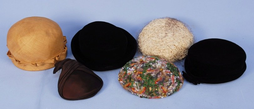 SIX PARIS DESIGNER HATS, 1950's.: Three Dior: One natural straw New York label, one allover velvet fringe, one sequined, both Paris label. Two Balenciaga black velvet. Good-excellent. MMA.