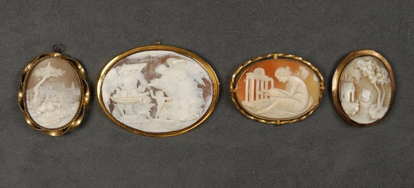 FOUR ITALIAN SHELL CAMEOS, 19th - EARLY 20th C.: All ovals: Two with classical scenes and two with pastoral landscapes. Largest 3 x 2, smallest 2 x 1/2. Excellent.