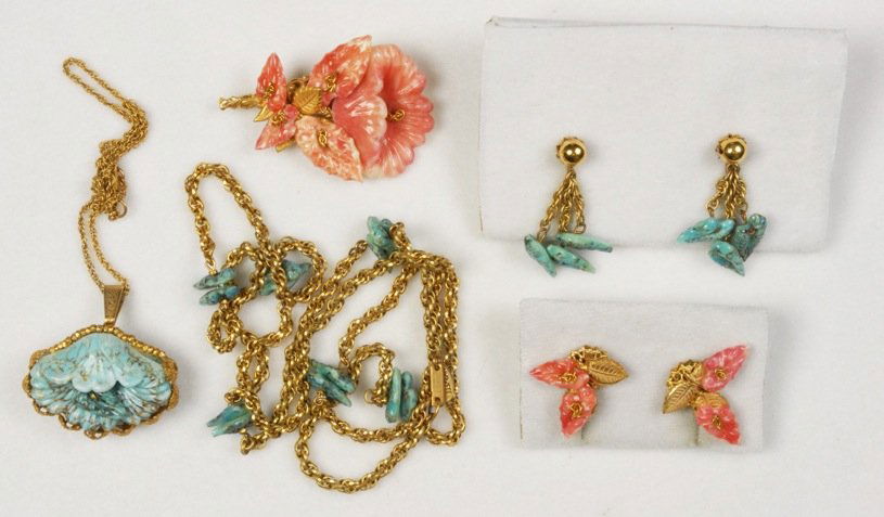 LOT of MIRIAM HASKELL JEWELRY.: All having gilt links and molded leaves and/or flowers: Chain necklace with blue leaf separators and matching ear clips, gilt chain with blue flower pendant, salmon colored pin with leaves and flower