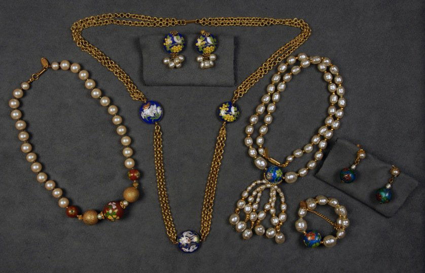 LOT of MIRIAM HASKELL CLOISONNE JEWELRY.: All with enameled balls or discs, gilt necklace and matching ear clips, 3-piece demi parure with pearls, pearl necklace. Signed. Necklaces 8 - 14 inches. (Small necklace some verdigris) good-excellent