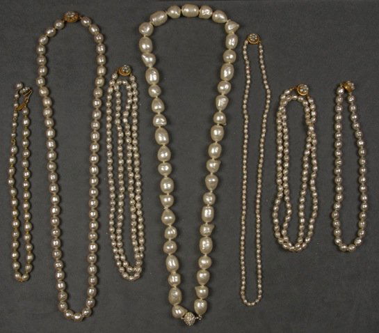 SEVEN MIRIAM HASKELL PEARL NECKLACES.: All single strand baroque pearls in various sizes. Signed. 7 1/2 - 18 inches. (Some with verdigris to spacers) good-excellent.