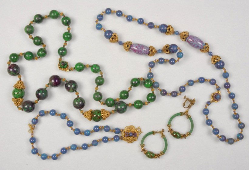 LOT of MIRIAM HASKELL JEWELRY.: Gilt metal filigree with marbled glass and plastic beads, one blue necklace with matching two strand bracelet, one green necklace with matching hoop earrings. Signed. Necklaces 15 inches. Excellent.
