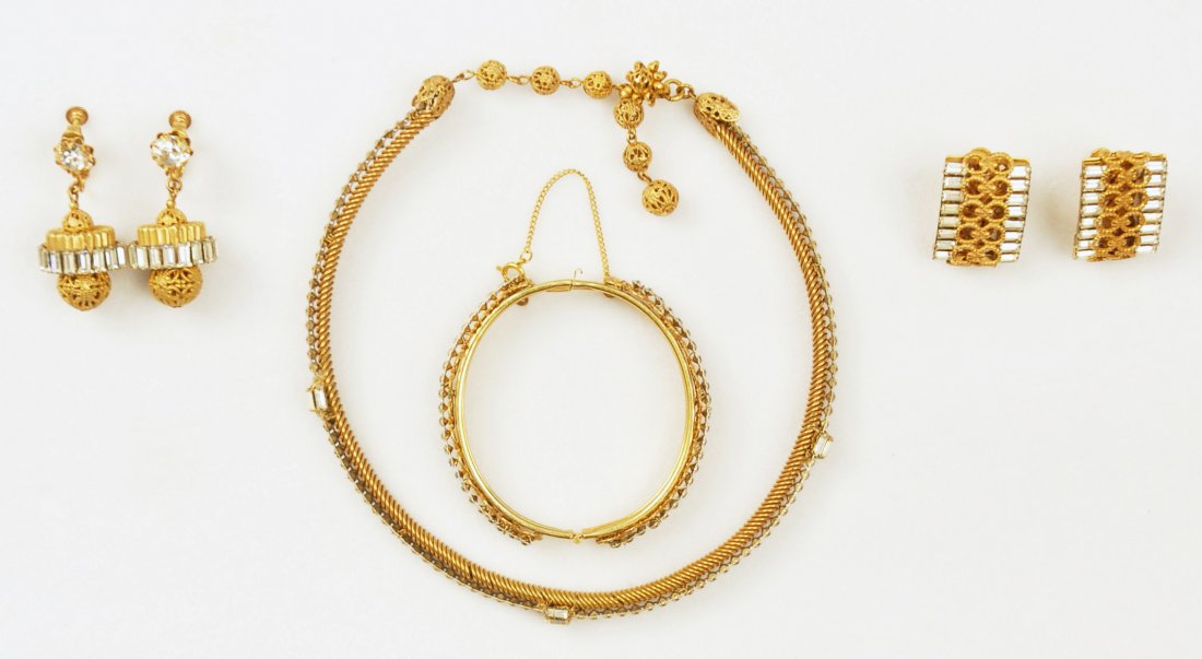 FOUR PIECES MIRIAM HASKELL JEWELRY.: All having a band of emerald cut stones and gilt metal: Choker with rope edge and hook clasp, hinged bangle bracelet and two pair clip earrings. All signed. Excellent.
