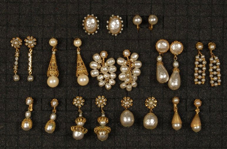 LOT of MIRIAM HASKELL PEARL EARRINGS.: Mostly drops, some with rhinestones and/or gilt filigree. Signed. Eleven pairs. Longest 2 inches. (Few minor verdigris) good-excellent.