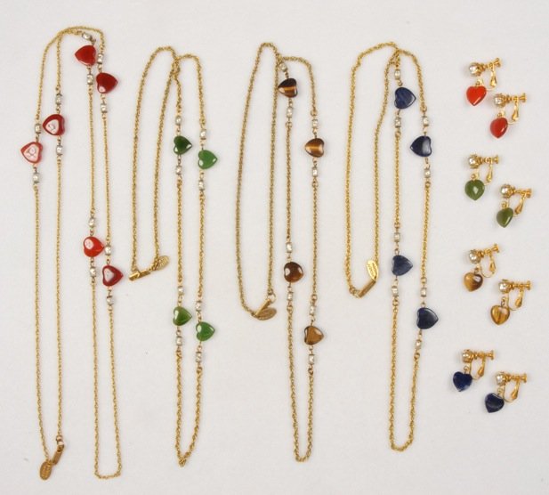 FOUR MIRIAM HASKELL NECKLACE and EARRING SETS.: All gilt chains having pearl and heart shaped separators and matching ear clips in various colors. Signed. Necklaces 15 - 31 inches. Excellent.
