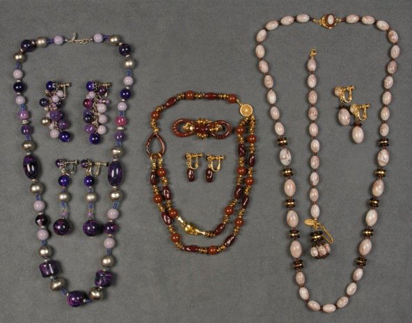 LOT of MIRIAM HASKELL BEAD JEWELRY.: Including art glass, resin and plastic beads in shades of grey and purple, two demi parures and one necklace with two pair earrings. Signed. Necklaces 8 1/2 - 15 inches. Good-excellent.