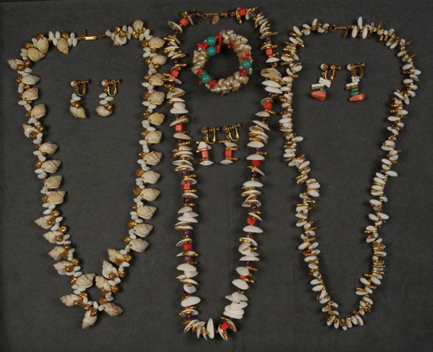 LOT of MIRIAM HASKELL SHELL JEWELRY.: Faux and natural shells, some gilt, three necklaces, two having faux coral, memory wire bracelet and three pair matching earrings. Signed. Necklaces 15 inches. Excellent.
