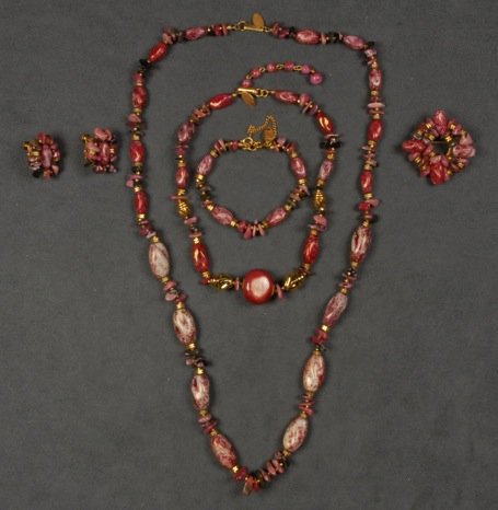 LOT of MIRIAM HASKELL JEWELRY.: Gilt metal with pink and mauve mottled beads, two necklaces, bracelet, pin and ear clips. Signed. Necklaces 8 - 14 inches. Excellent.