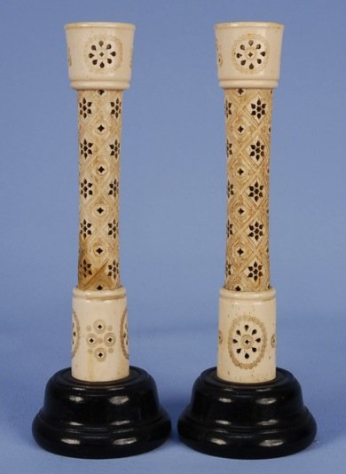 PAIR of IVORY CANDLESTICKS, 19th C.: Pierced and carved on wood stands. 8 inches. Very good.