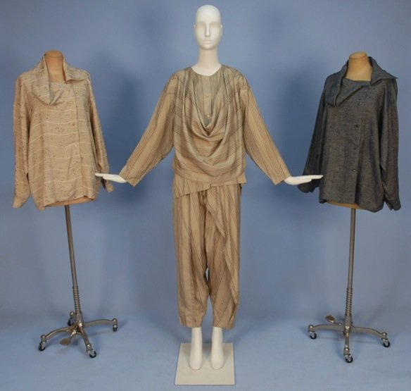 ISSEY MIYAKE PRINTED SILK TUNIC and PANTS, 1980's.: Taupe with variegated brown stripe, tunic having button front beneath draped front panel, wrap front Japanese style pants. Size S, W-24. Together with two Miyake silk and linen big shirts with draped 