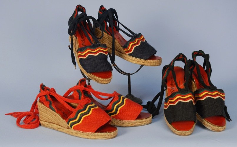 THREE PAIR YVES SAINT LAURENT PARIS WOVEN ESPADRILLES,: All rope wedge and sole with colorful embroidery and ballet ties in red, navy and black. Size 7. Good-excellent.
