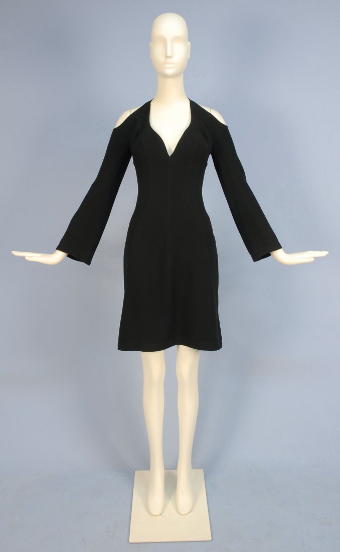 THIERY MUGLER LITTLE BLACK DRESS with CUTOUT SHOULDERS,: Black polyester having long slightly flared sleeve, shaped V-neck, shoulder cutout with curved seam details and padded bust, back zip closure with self button. Labeled, size 38. Excellent.