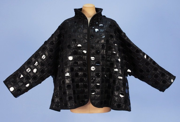 GEOFFREY BEENE KIMONO JACKET with OVERSIZED SEQUINS, 20: Black fabric with iridescent threads quilted in a pattern of squares having black sequins in alternating blocks, high neck tent style with quilted vinyl lining. Labeled. One size. Few missing and brok