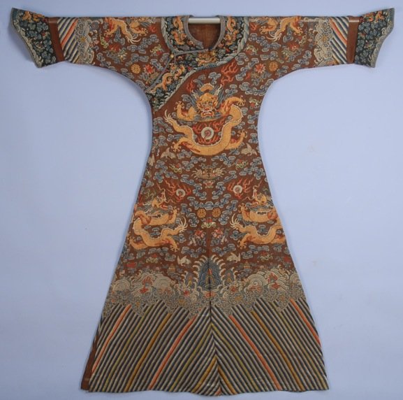 CHINESE EMBROIDERED NINE DRAGON SILK GAUZE SUMMER ROBE,: Couched metallic gold dragons with cranes, clouds, flowers, flaming pearls, etc., worked in counted silk stitches, li shui border, black neck band and horse hoof cuff. 54 x 58. (Neck binding worn, som