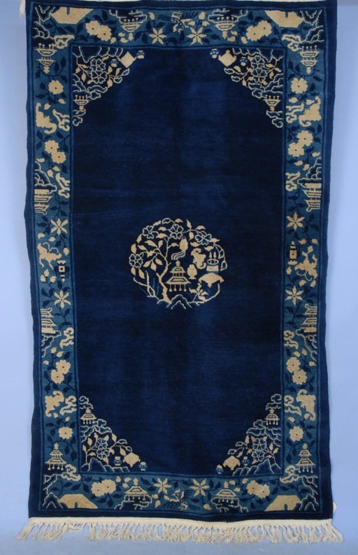 PEKING CHINESE CARPET, 20th C.: Blue and white design with flowers and birds. 4' x 6' 10". (New selvedges and fringe) otherwise excellent.