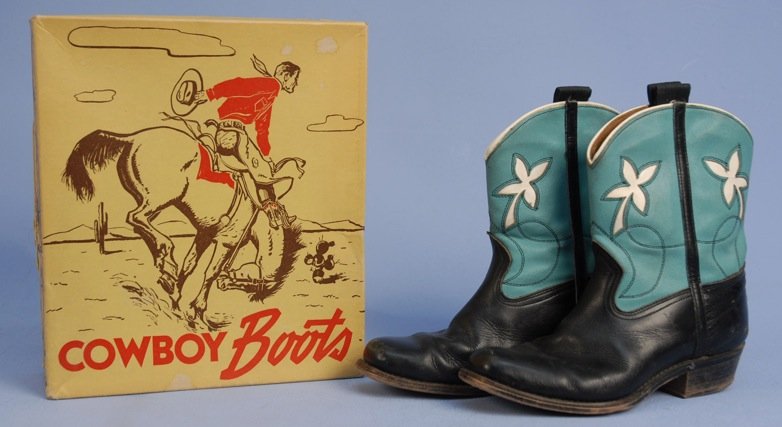 CHILD'S TRI-TONE COWBOY BOOTS and BOX, 1960s.: Black with turquoise shaft cut to white with black stitching. Label "Goding Boots" with original reciept. 9 x 3 3/8 x 8 1/2 inches high. (Minor scuffs) very good.