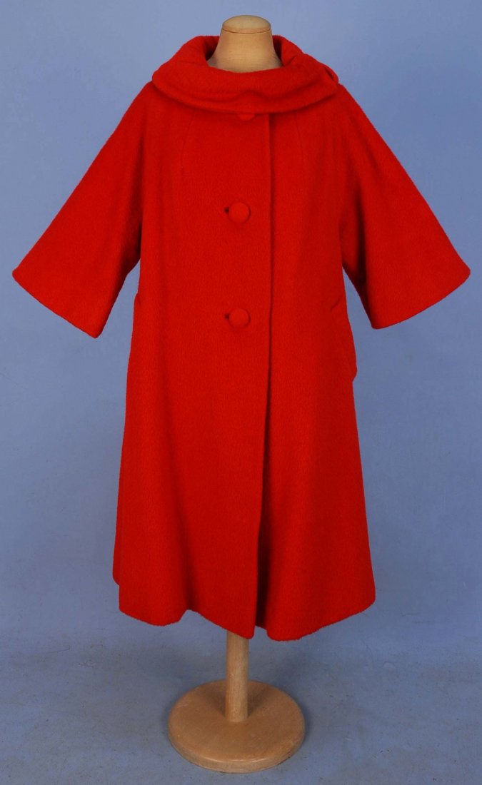 LILLI ANN MOHAIR SWING COAT, 1950's.: Red wool with 3/4 raglan sleeve, fold-over collar with side snaps, three large self buttons, angled pockets and satin lining. "Tisse a Paris" label. B-48, L-39. Excellent.