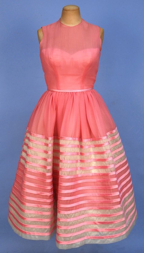 MARTHA ORIGINAL STRIPED ORGANDY PARTY DRESS, 1950's.: Bubblegum pink having sleeveless bodice over sweetheart corset, full skirt with wide white bands decorated with applied bands of pink satin ribbon tied in a series of bows along back seam, organdy and