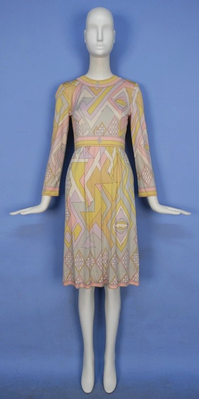 PUCCI PRINTED SILK DAY DRESS, 1960's.: Signature "Emilio" abstract print in pastel tones, having long sleeve, banded neck and waist, slightly gathered skirt with inverted front pleat. Labeled. B-34, W-27, L-42. (Spots on back of both sleev