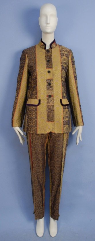 ETRO SILK and WOOL BROCADE PANTS SUIT.: Long jacket with stand collar and faux pockets with purple velvet trim, double vented back, size 42. Matching straight leg trouser with front zipper, size 46. Labeled. Excellent.