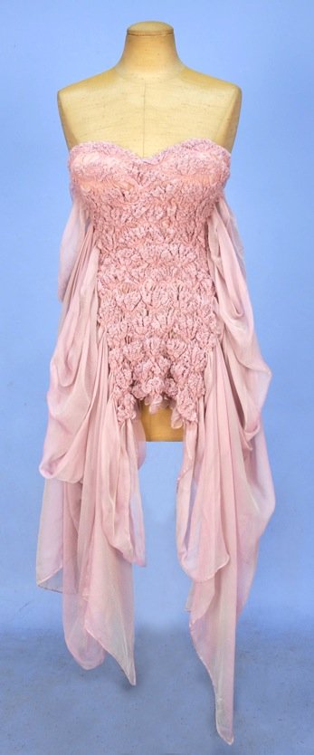ALEXANDER McQUEEN RUCHED CHIFFON CORSET, EARLY 21st C.: Strapless boned nude foundation with padded cup and back zipper beneath dusty pink chiffon ruched across bust and center front and gathered into flowing side panels. Labeled. Marked size 38. Excellent