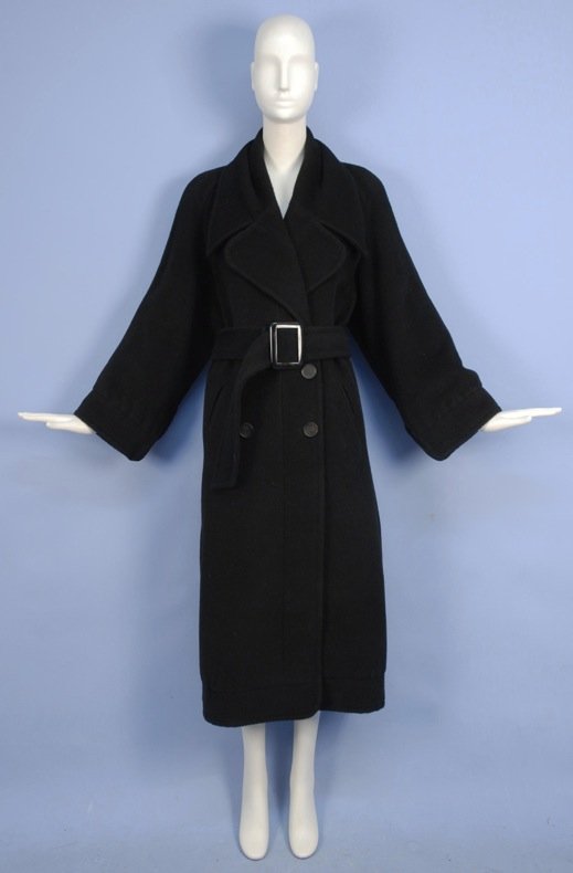 KARL LAGERFELD WOOL and ALPACA COAT.: Black double breasted style with oversized collar, very slightly gathered into cuff and hem band, angled pockets, wide belt. Labeled, marked size 36. Excellent.