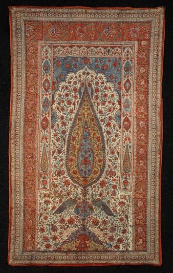 INDIAN KALAMKARI, 19th C.: Printed cotton in single 43 inch width, prayer design having cypress trees, flowers and peacocks. (Few scattered quarter size stains and small corner repair) good. FIT.