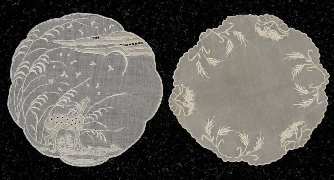 TWO SETS of TWELVE MARGHAB MADEIRA GOBLET ROUNDS, 20th: Scalloped white organdy: One with cutwork and embroidered deer, moon and grasses, diameter 5 1/2. One with waterlilies and wheat, (one tiny hole). Excellent.