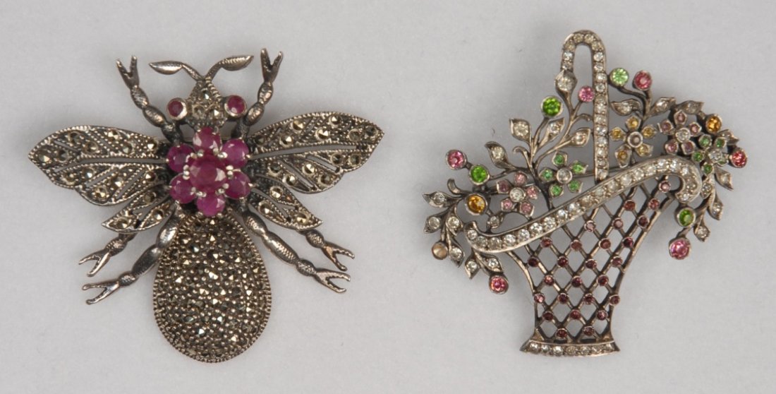 TWO SILVER PINS, EARLY 20th C.: One French 900 silver basket pin set with semi precious stones, marked depose, 2 inches, (missing one stone). One sterling beetle pin with articulated abdomen set with marcasites and semi precious sto