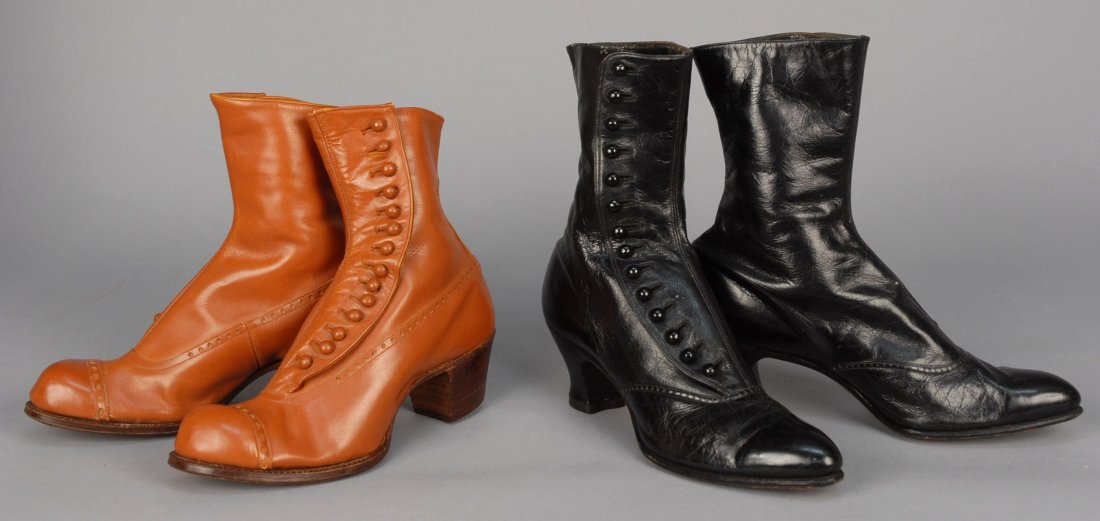 TWO PAIR LADIES HIGH BUTTON BOOTS, EARLY 20th C.: Both leather with perforated details and linen lining: One black Dorothy Dodd, 10 x 9 1/2. One light brown Endicott Johnson, 9 1/2 x 8. Excellent.