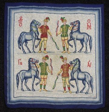 HERMES, PARIS LES AURIGES PRINTED SILK SCARF, ISSUED: Navy twill bordering a mosaic design of four Roman charioteers, artist Hugo Grygkar, labeled within design. 33 1/2 x 35 1/2. (Small spot on border, faints stain in center) good.