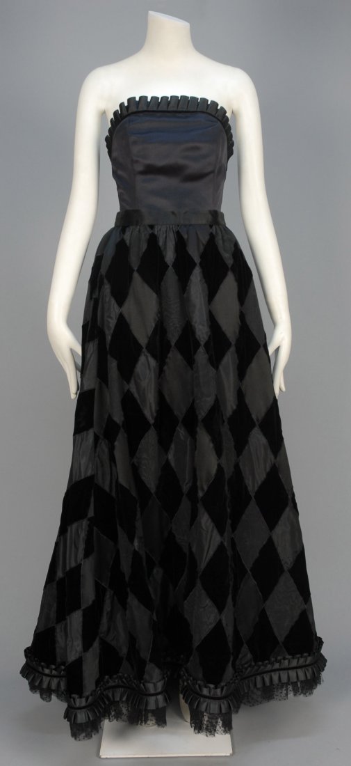 SAINT LAURENT RIVE GAUCHE STRAPLESS SILK and VELVET: Two-piece having boned bodice with satin front and velvet back, the top trimmed with pleated ruffle, slightly trained full skirt pieced in harlequin diamonds of satin, velvet and moire faille, pleated