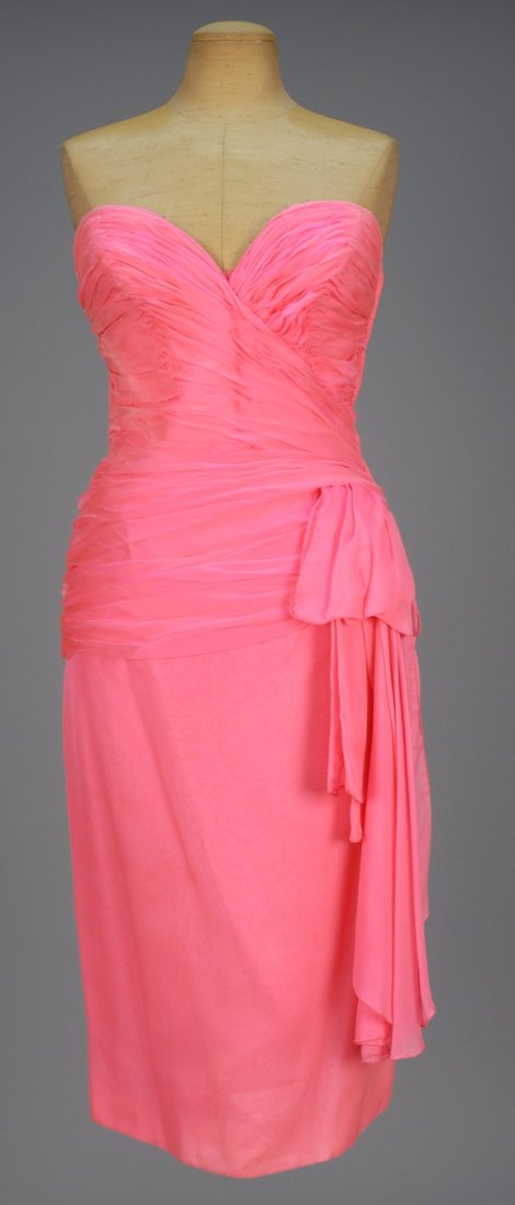 VICKY TIEL PARIS STRAPLESS CHIFFON COCKTAIL DRESS.: Bubblegum pink silk having boned and ruched sweetheart bodice with side drape, narrow skirt, fully lined. Labeled. B-34, W-26, H-38, L-38. Excellent.