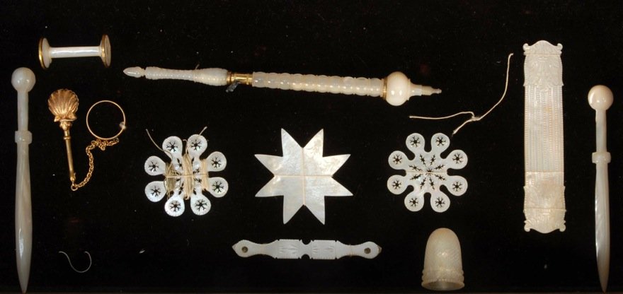 LOT of MOTHER of PEARL NEEDLEWORK TOOLS, 19th C.: Including crochet hook, thimble belonging to the Grand Duchess of Baden, thread spools, winders, shuttles, needle case and gold handkerchief holder. Excellent. Ex Collection Gertrude Whiting. FIT.