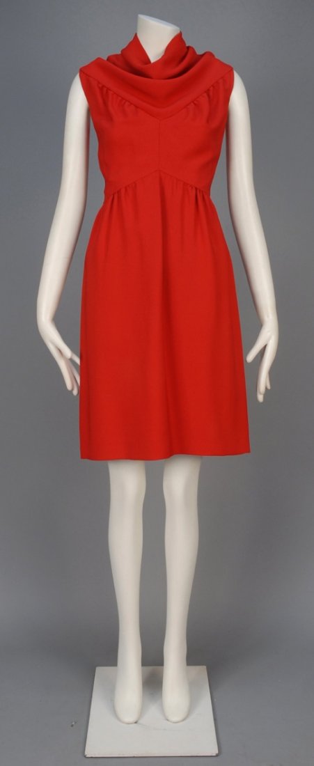 GUY LAROCHE LICENSED COPY SILK COCKTAIL DRESS, MID 20th: Sleeveless red crepe with draped neckline over bodice shaped with "Y" seam and angled waistband, slightly gathered skirt, silk lining. Maria Carine label stamped 13338. B-38, W-28, H-40, L-38. (Tiny p