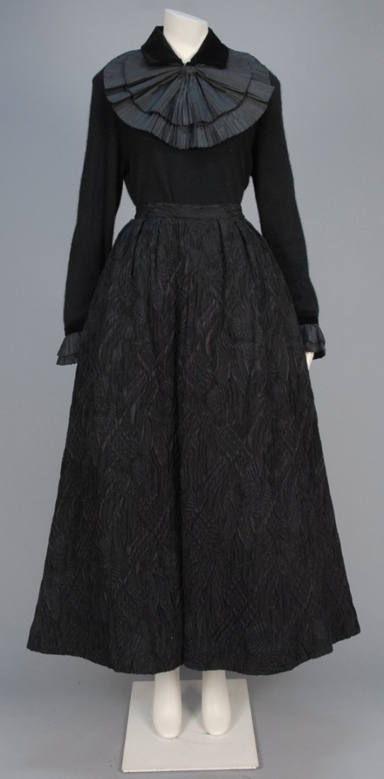 CHRISTIAN DIOR WOOL and SILK EVENING SKIRT, 1970s.: Black puckered and textured weave full skirt having pleats at waist, crinoline and satin underskirts. Boutique label. W-28, L-37. Together with a French wool blend sweater having velvet and pleated ta