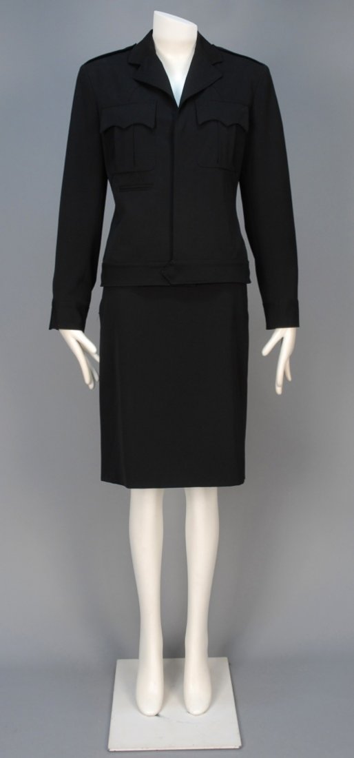 JEAN PAUL GAULTIER SKIRT SUIT with MILITARY STYLING,: Black wool blend Eisenhower style jacket and matching narrow skirt with back belt detail and deep vent, striped satin lining. Labeled. B-38, jacket L-23, W-28, H-37, skirt L-24. Excellent.